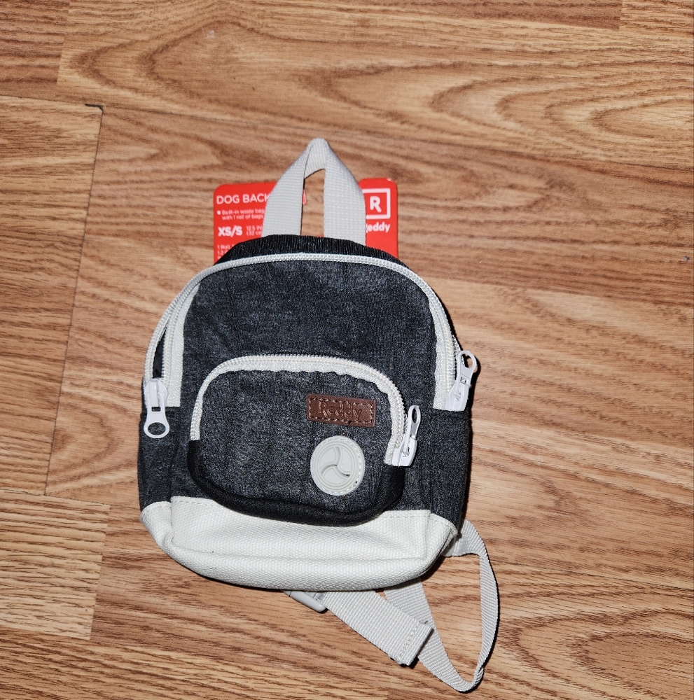 Small black and grey dog backpack